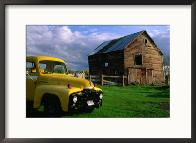 Old Barn And Yellow Pick-Up Truck In Montana, Montana, Usa by Carol Polich Pricing Limited Edition Print image