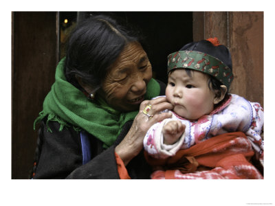 Woman With Child, Tibet by Michael Brown Pricing Limited Edition Print image
