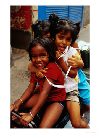 Portrait Of Children Sitting On Motorbike, Chowringee, India by Anthony Plummer Pricing Limited Edition Print image