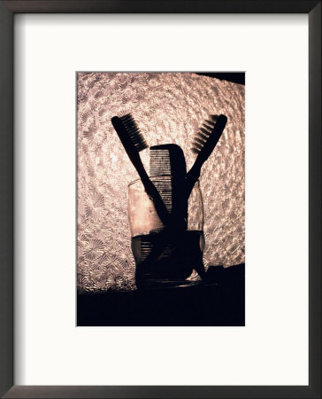 A Comb And Two Toothbrushes On A Bathroom Windowsill by Stephen St. John Pricing Limited Edition Print image