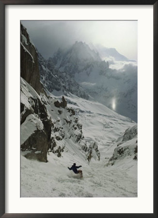An Extreme Skier In Pas De Chevres Couloir Mount Blanc Is In The Background by Gordon Wiltsie Pricing Limited Edition Print image