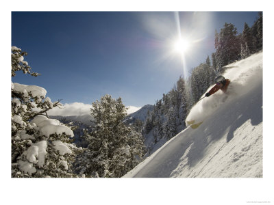 Man Skiing In Deep Powder At Solitude Mountain Resort, Utah, Usa by Mike Tittel Pricing Limited Edition Print image