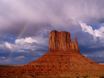 Rock Formation With Clouds Behind, Monument Valley Navajo Tribal Park, Arizona, Usa by Curtis Martin Pricing Limited Edition Print image