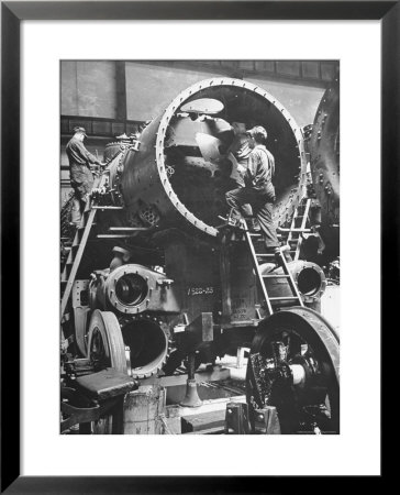 Workers Putting Together The Boiler Tube Portion Of An 0-8-0 Switching Locomotive by Andreas Feininger Pricing Limited Edition Print image