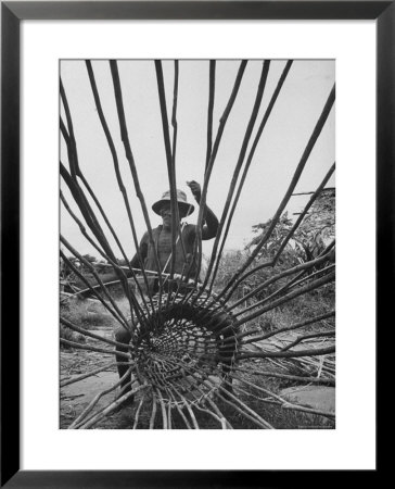 Man Making A New Trap For Fishing by Dmitri Kessel Pricing Limited Edition Print image