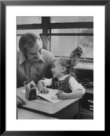 First Grade Teacher Bill L'orange Talking With Student Kim Moscato At Calumet School by Leonard Mccombe Pricing Limited Edition Print image