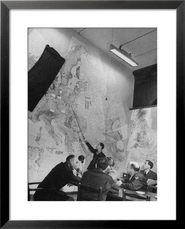 Gen. Ira Eaken In Briefing Session By Intelligence Officer Lt. James Parton Uses Pointer On Map by Margaret Bourke-White Pricing Limited Edition Print image