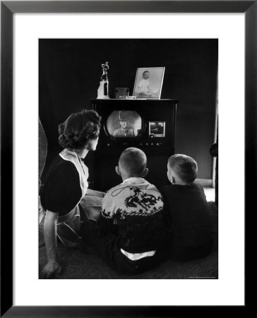 Mother And Two Children Sitting On Floor Of Living Room Watching A Western On Tv by Alfred Eisenstaedt Pricing Limited Edition Print image