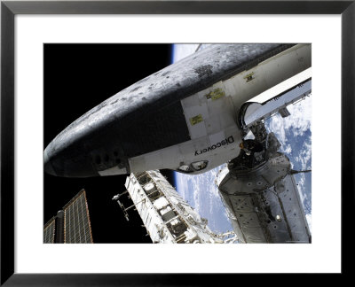 Space Shuttle Discovery Docked To The International Space Station by Stocktrek Images Pricing Limited Edition Print image