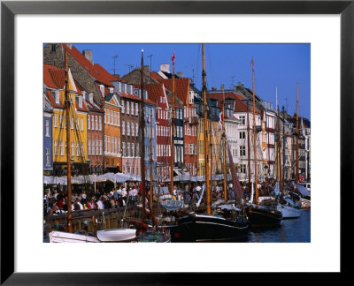 Yachts Moored In Front Of Cafes At Nyhavn, Copenhagen, Denmark by Holger Leue Pricing Limited Edition Print image