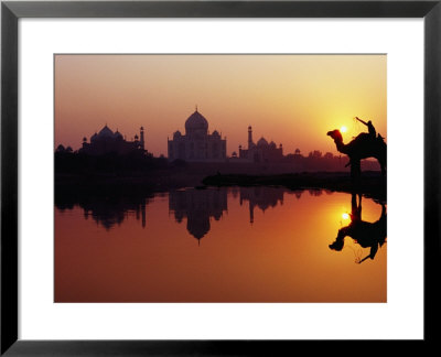 Taj Mahal And Silhouetted Camel And Reflection In Yamuna River At Sunset by Richard I'anson Pricing Limited Edition Print image