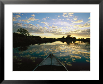 Clouds Reflecting On Waters' Surface At Twilight With Bow Of Boat by Steve Winter Pricing Limited Edition Print image