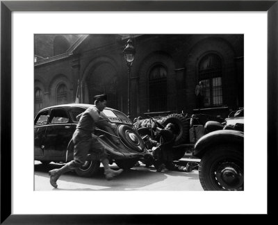 Soldier Of Le Clerc's Free French Troops Dashes To Aid French Resistance Fighter by Ralph Morse Pricing Limited Edition Print image