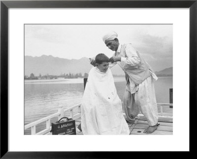 American Tourist, Young Danny Thomas Receiving Hair Cut On House Boat During Vacationing by James Burke Pricing Limited Edition Print image