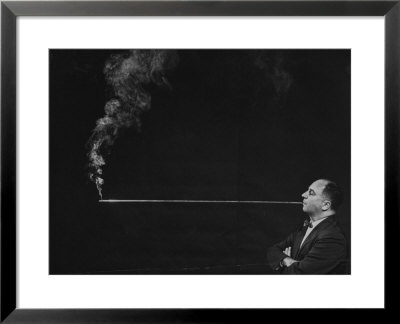President Of Zeus Corp., Robert Stern, Smoking From Self-Designed Four Foot Long Cigarette Holder by Yale Joel Pricing Limited Edition Print image