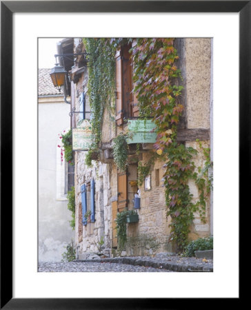 Cobblestone Street With Half Timber Stone Houses, Place De La Myrpe, Bergerac, Dordogne, France by Per Karlsson Pricing Limited Edition Print image