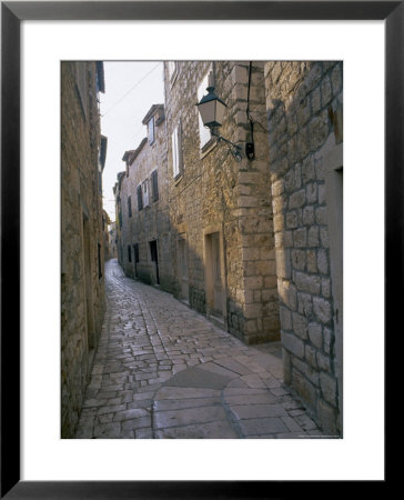 Street In Port Of Stari Grad, Hvar Island, Dalmatia, Dalmatian Coast, Adriatic, Croatia, Europe by J P De Manne Pricing Limited Edition Print image