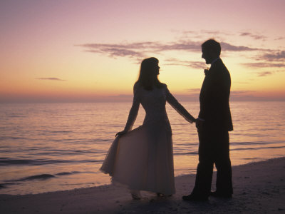 Sunset Silhouette Of Bride And Groom In Seascape by Frank Simonetti Pricing Limited Edition Print image