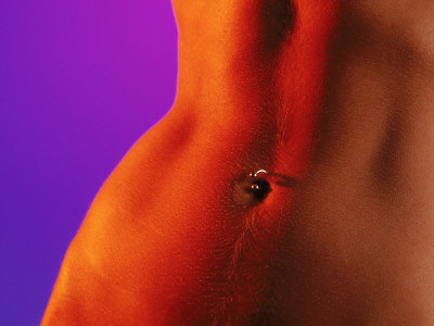 Stomach Of A Fit Woman With Navel Ring by Tomas Del Amo Pricing Limited Edition Print image