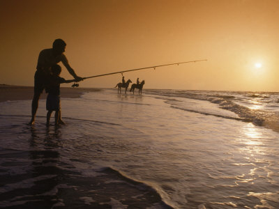 Silhouette Of Father And Son Fishing by Peter Langone Pricing Limited Edition Print image