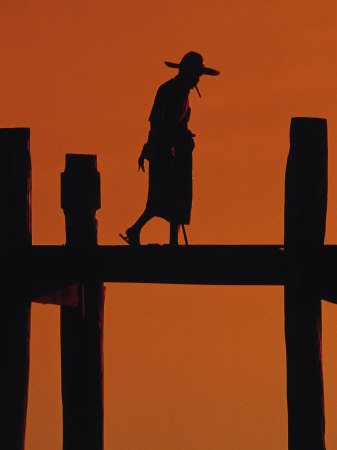 Silhouette, Man With Hat On Bridge, Sunset, Myanmar by Inga Spence Pricing Limited Edition Print image