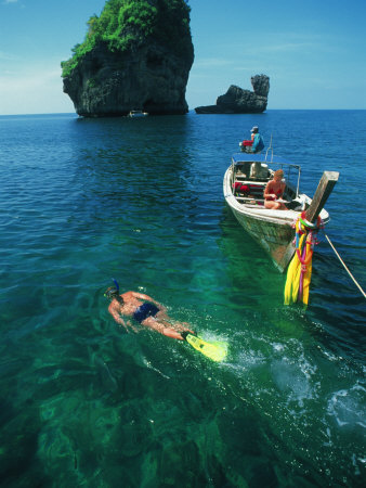 Boat And Snorkeler, Koh Phi Phi, Thailand by Jacob Halaska Pricing Limited Edition Print image
