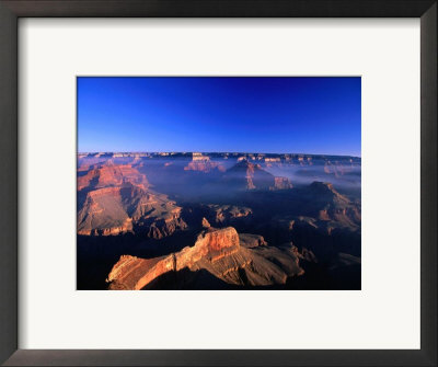 Aerial View Of The Intense Colours Of The Canyon Rims, Grand Canyon National Park, Usa by Mark Newman Pricing Limited Edition Print image