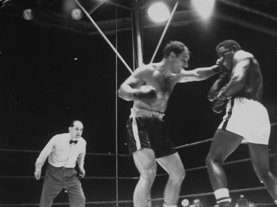 Boxers Rocky Marciano And Ezzard Charles Boxing One Another For Heavyweight Championship by Ralph Morse Pricing Limited Edition Print image