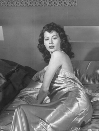 Ava Gardner Wearing Satin Nightgown While Lounging On Satin Bed In Movie One Touch Of Venus by J. R. Eyerman Pricing Limited Edition Print image