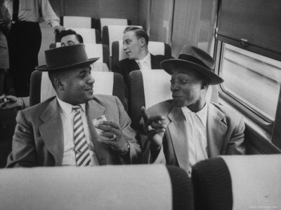 Dodger Players Roy Campanella And Sandy Amoros Engaging In A Conversation During Bus Trip by Francis Miller Pricing Limited Edition Print image