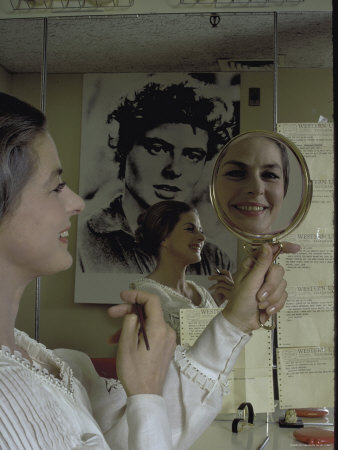Ingrid Bergman Looking At Reflection In Mirror Applying Make Up During For Whom The Bell Tolls by Bill Ray Pricing Limited Edition Print image