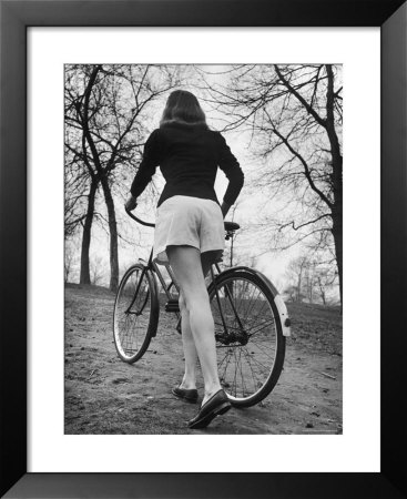 Bicycle Being Pushed By A Typical American Girl by Nina Leen Pricing Limited Edition Print image