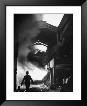 Man Walking In The Smokey Steel Mill by Nat Farbman Pricing Limited Edition Print image