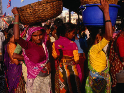 Women Balancing Fish Baskets At Fish Market On Sassoon Dock, Mumbai, Maharashtra, India by Dallas Stribley Pricing Limited Edition Print image