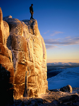Climber Atop Summit Tor, Beinn Mheadhoin In The Cairngorms, United Kingdom by Cornwallis Graeme Pricing Limited Edition Print image