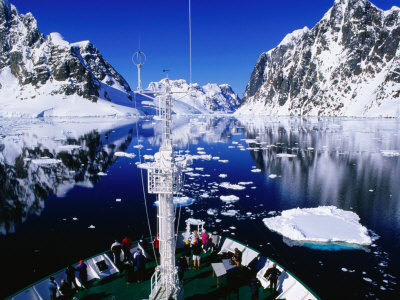 Ioffe Ship Icebreaking Through Lemaire Channel, Paradise Bay, Antarctic Peninsula, Antarctica by Juliet Coombe Pricing Limited Edition Print image