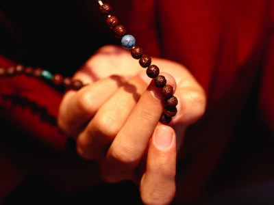 Monk's Hands Holding Prayer Beads, Bodhnath, Nepal by Ryan Fox Pricing Limited Edition Print image