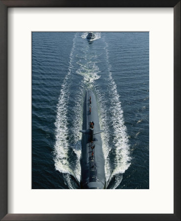 A Los Angeles-Class Attack Submarine Cruises Into Port by Joel Sartore Pricing Limited Edition Print image