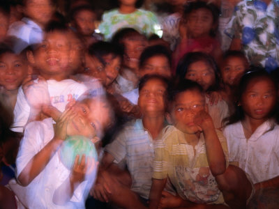 Children From Vietnamese Floating Village Of Kampong Pluc, Just Outside Siem Reap, Cambodia by Juliet Coombe Pricing Limited Edition Print image