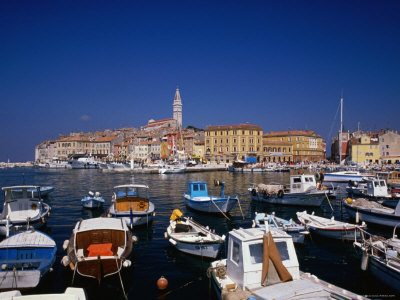 Boats In Harbour And Town In Distance On Adriatic Coast, Rovinj, Croatia by Jon Davison Pricing Limited Edition Print image