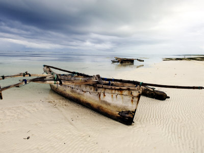 Fishing Boat Lying On The Beach, Zanzibar by Ariadne Van Zandbergen Pricing Limited Edition Print image