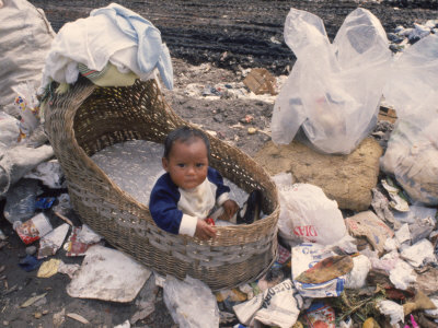 Baby In Bassinet Left At Dump, Mexico City, Mex by Alyx Kellington Pricing Limited Edition Print image