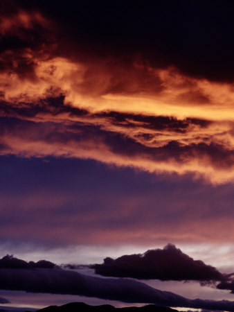 Dark & Orange Sunset Clouds Over Mountains by David Ennis Pricing Limited Edition Print image