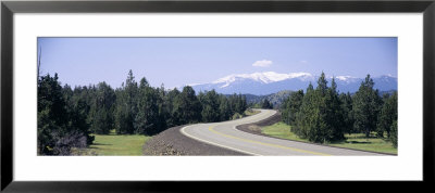Road In A Forest With Snowcapped Mountains In The Background, Mt Shasta, Yreka, California, Usa by Panoramic Images Pricing Limited Edition Print image