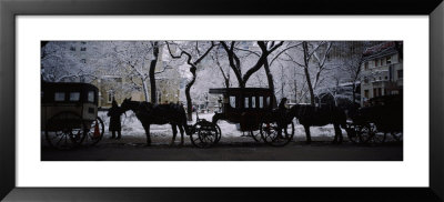 Silhouette Of Horse Drawn Carriages, Chicago, Illinois, Usa by Panoramic Images Pricing Limited Edition Print image