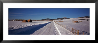 Haystacks In A Snow Covered Landscape, Avon, Montana, Usa by Panoramic Images Pricing Limited Edition Print image