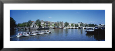 Ferry In A Lake, Amsterdam, Netherlands by Panoramic Images Pricing Limited Edition Print image