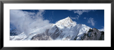 Sagarmatha National Park, Nuptse, Low Angle View Of Clouds Around Snow Covered Mountains, Nepal by Panoramic Images Pricing Limited Edition Print image