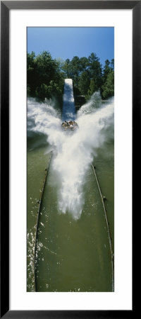 Group Of People Riding On A Log Flume At An Amusement Park by Panoramic Images Pricing Limited Edition Print image