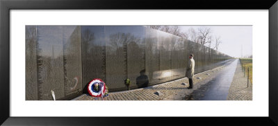 Person Standing In Front Of A War Memorial, Vietnam Veterans Memorial, Washington D.C., Usa by Panoramic Images Pricing Limited Edition Print image